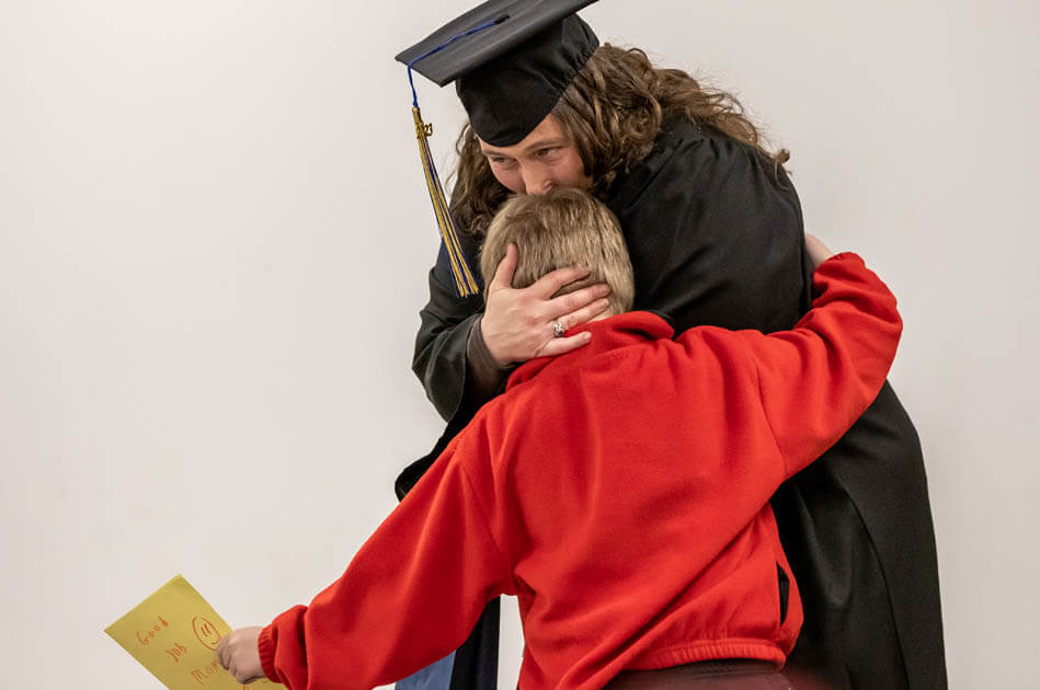 Graduation hug